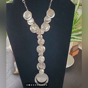 25 inch length sterling silver disc. True statement piece is absolutely gorgeous